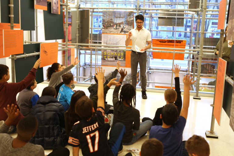 Dustin Atlas, School Programs Coordinator, leads a discussion about the structure of scaffolding. Credit: Center for Architecture.