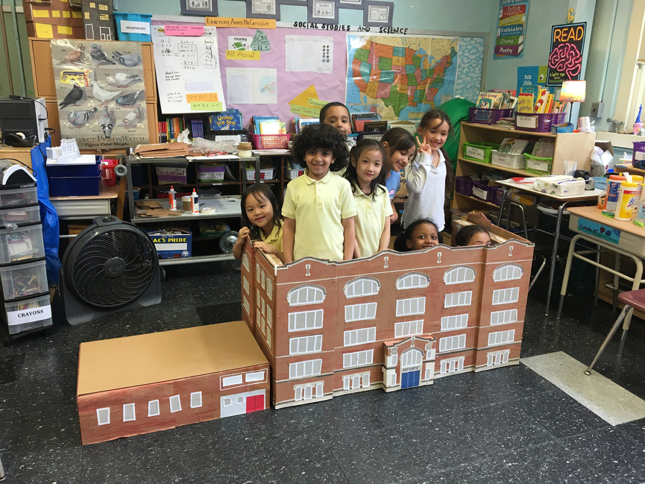 PS 102M: First grade students created a large-scale model of their 103-year-old school building in East Harlem with Design Educator Dustin Atlas as the culminating project in this ten-session residency focused on neighborhood architecture and history.  