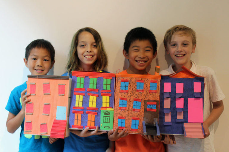 On their way to designing a house of the future, students learned about NYC’s historic houses and created their own model rowhouses. Photo by Leo Ku.