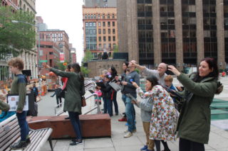 Families looking at architecture outside
