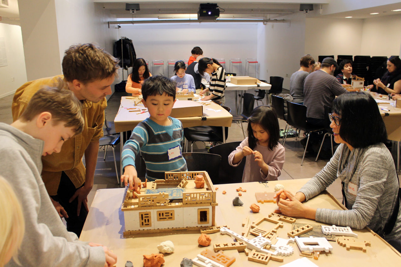 The “playshop” at the Center gave families an opportunity to play with this new toy and give feedback to the House4House team about both its design and its business model. Image credit: Center for Architecture.