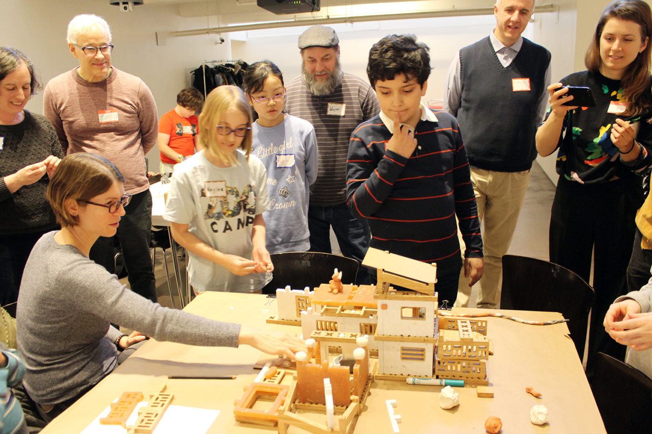 After a gallery walk around the room, where each family presented their creations to the others. Image credit: Center for Architecture.