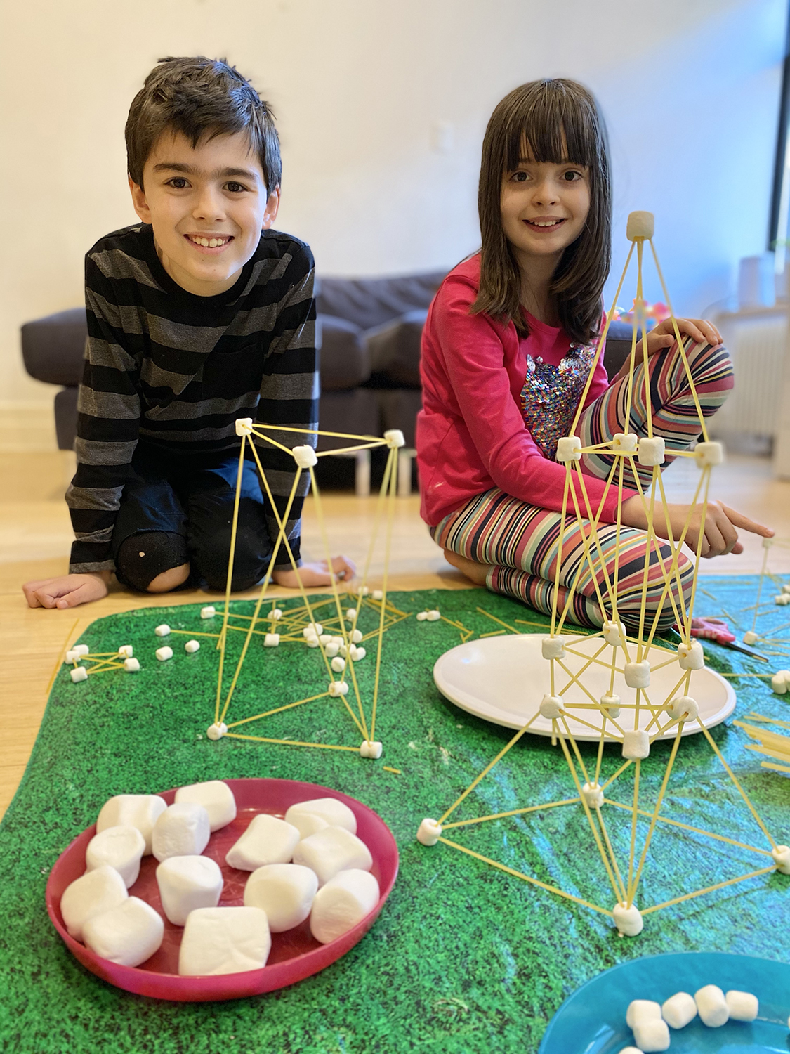 Participants show off their work for the March 9 Skyscraper Design workshop. Photo: Vanessa Kasabach.
