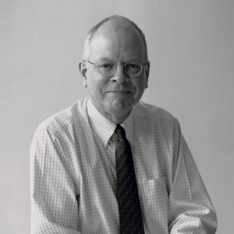 A black and white headshot of David Childs.