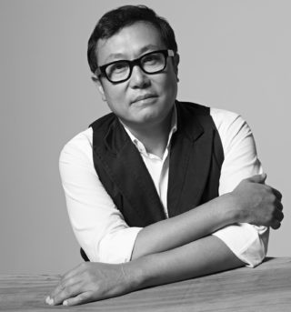 Black and white photo of Calvin Tsao.