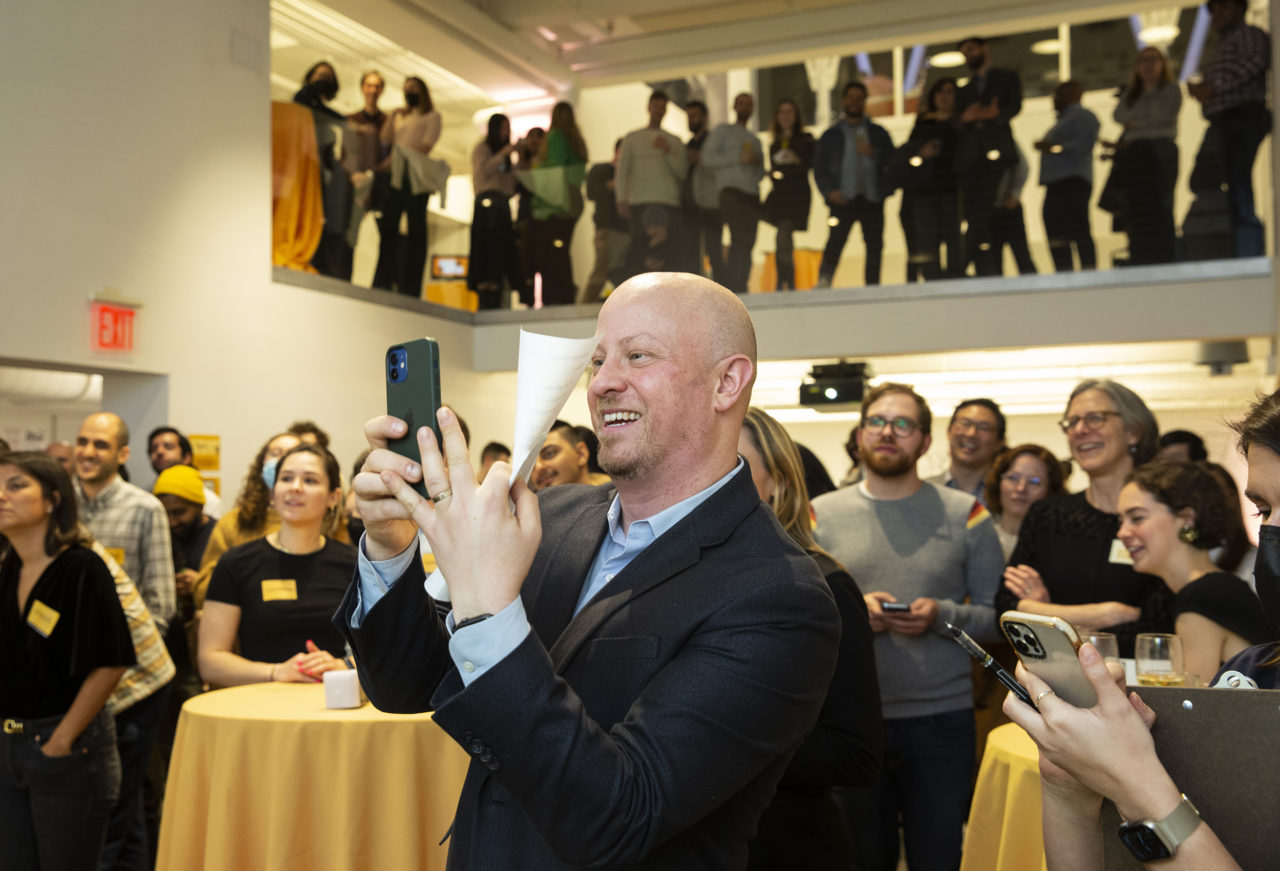 AIANY and Center for Architecture executive director Ben Prosky, Assoc. AIA snaps a photo of the competition.