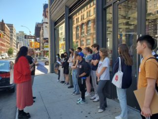 High School students outside looking at buildings