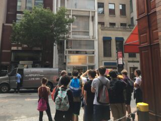 Group of high school students standing outside the Modulightor Building