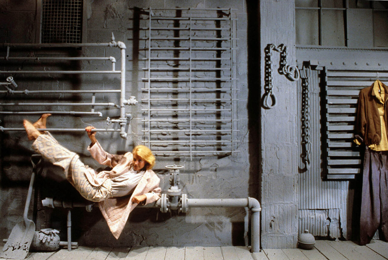 WilliWear Men's Showroom: fashion showroom and executive offices, New York. Interior wall with collage of street artifacts.