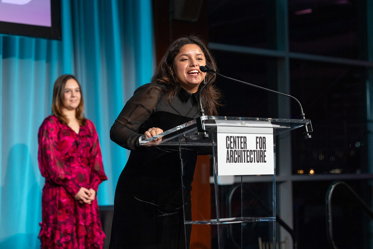 Student scholarship recipient Catherine Moreno at the podium. Photo: Jenna Bascom Photography.