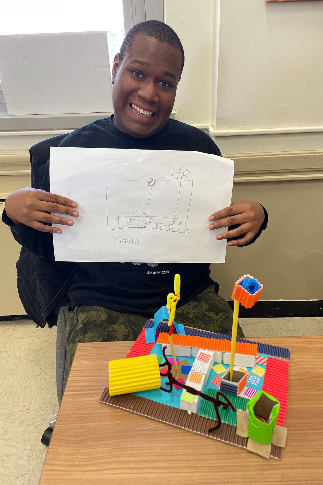 Boy poses with his park model.