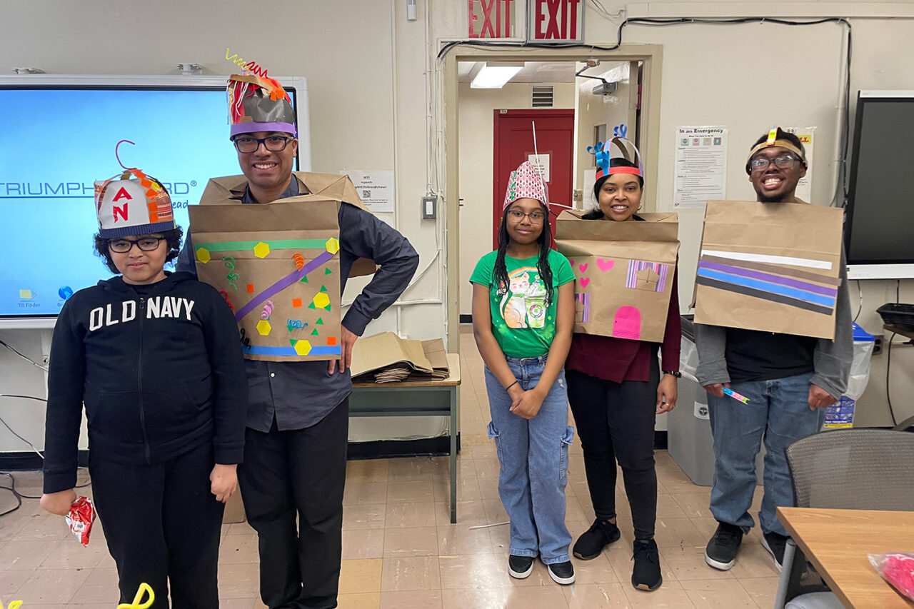 Kids pose in their wearable architecture costumes.