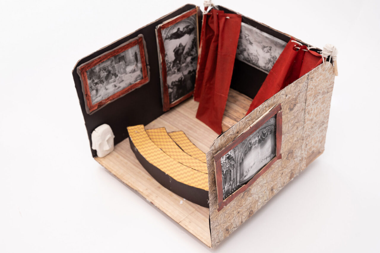 A closeup of a student model designed after a theater