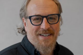 Headshot image of Jordan Rogove, FAIA, Co-founder, DXA Studio